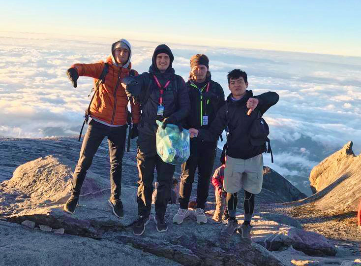 Climbers and Mountain Guide Cleans Up Summit Trail